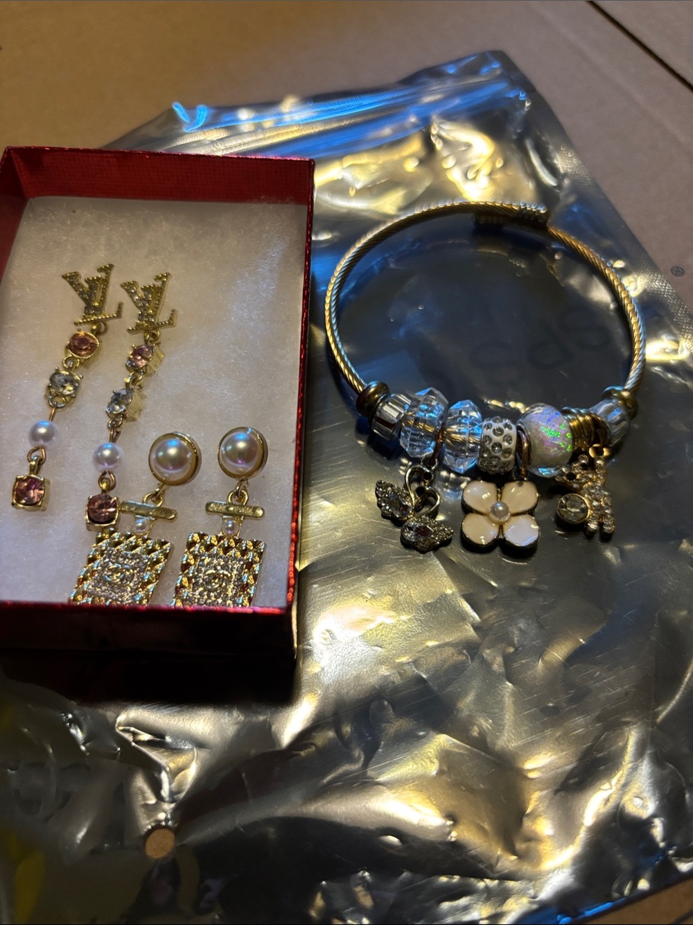 Charm Bracelet with 2 sets of earrings